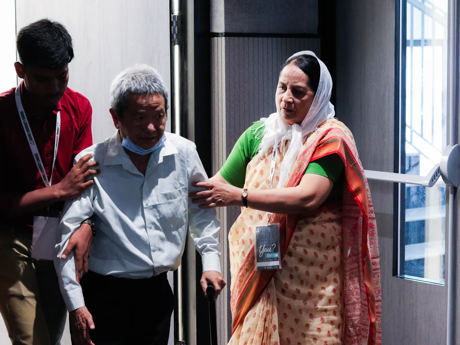 Volunteers serving at a community distribution