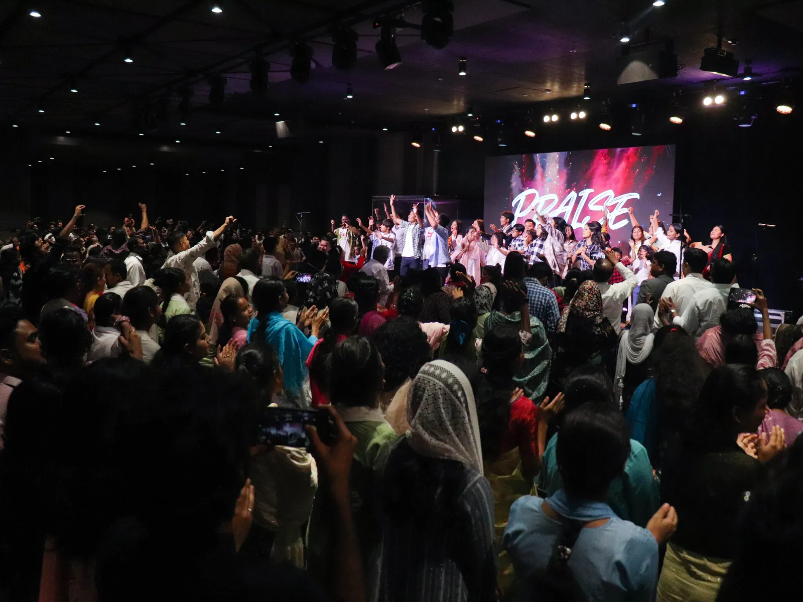 Members praying together for the city