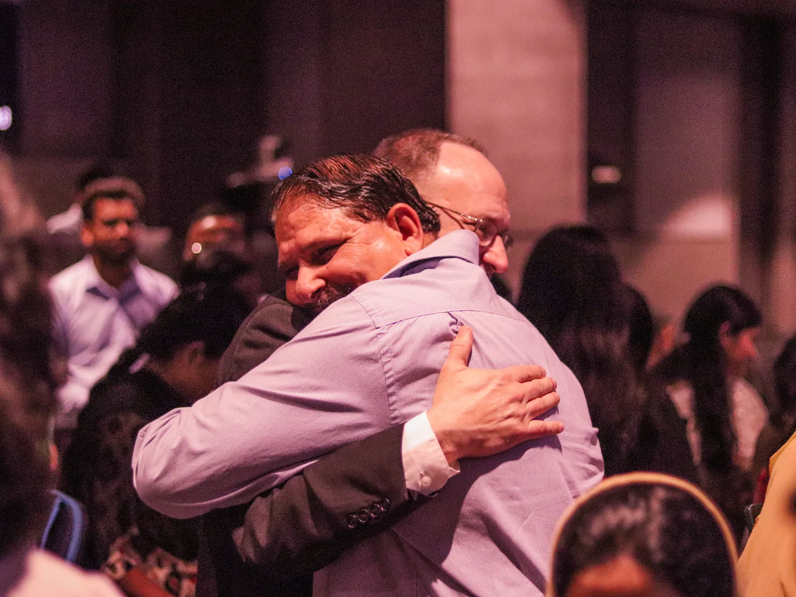 Members welcoming visitors after a service